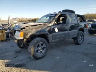 ✅ 1998 Jeep Grand Cherokee Laredo • VIN: 1J4FX58S4WC102623 • Lot: 86188764. Listed on Copart with 283,210 mi. Free auction sales archive from the USA and detailed vehicle history report at DreamBid. Image 1.