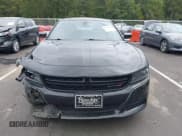 ✅ 2023 Dodge Charger SXT • VIN: 2C3CDXBG5PH579520 • Lot: 43245472. Listed on IAAI with 59,873 mi. Free auction sales archive from the USA and detailed vehicle history report at DreamBid. Image 12.