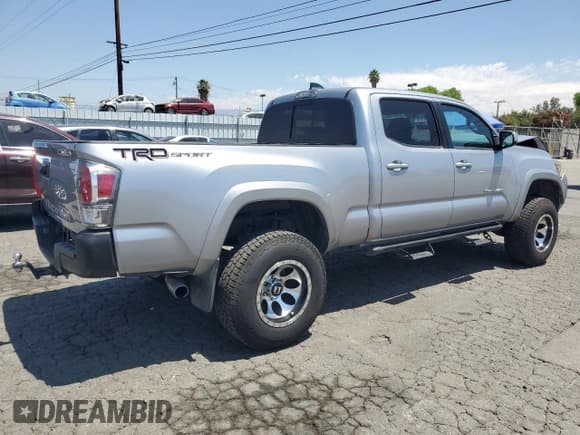 ✅ 2021 Toyota Tacoma SR5 • VIN: 3TYBZ5DN0MT000461 • Lot: 63437695. Listed on Copart with 80,017 mi. Free auction sales archive from the USA and detailed vehicle history report at DreamBid. Image 3.