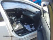 ✅ 2021 Toyota Corolla Hybrid LE • VIN: JTDEAMDE0MJ023312 • Lot: 43011113. Listed on IAAI with 32,696 mi. Free auction sales archive from the USA and detailed vehicle history report at DreamBid. Image 5.