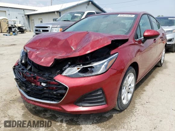 ✅ 2019 Chevrolet Cruze LT • VIN: 1G1BE5SM9K7140221 • Lot: 57411523. Listed on Copart with 97,731 mi. Free auction sales archive from the USA and detailed vehicle history report at DreamBid. Image 1.