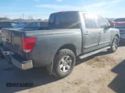 ✅ 2005 Nissan Titan LE • VIN: 1N6AA07B65N501054 • Lot: 41728466. Listed on IAAI with 318,859 mi. Free auction sales archive from the USA and detailed vehicle history report at DreamBid. Image 4.