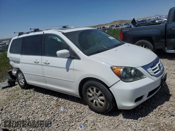 ✅ 2010 Honda Odyssey EX-L • VIN: 5FNRL3H65AB103622 • Лот: 59854745. Опубликован ранее на Copart с пробегом 106 093 миль. Бесплатный доступ к архиву аукционных продаж из США и подробный отчёт об истории автомобиля на DreamBid. Изображение 4.