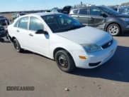 ✅ 2007 Ford Focus S • VIN: 1FAFP34NX7W308254 • Lot: 43590605. Listed on IAAI with 154,344 mi. Free auction sales archive from the USA and detailed vehicle history report at DreamBid. Image 1.