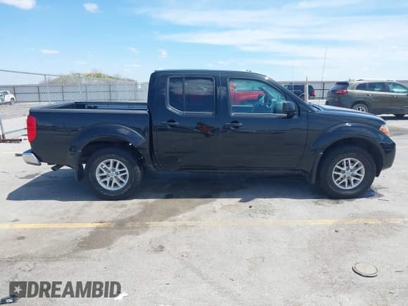 ✅ 2018 Nissan Frontier SV • VIN: 1N6AD0EV7JN714254 • Lot: 42333057. Listed on IAAI with 56,460 mi. Free auction sales archive from the USA and detailed vehicle history report at DreamBid. Image 13.
