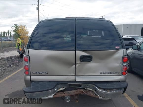 2001 Chevrolet Tahoe LT with VIN 1GNEK13T71J239513, listed as a IAAI auction lot 43437806 with 216,160 mi miles and . Bid and sale history available at DreamBid. Image 16.