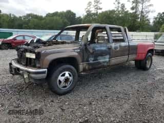 1994 Chevrolet Silverado 3500 с VIN 1GCHK33F4RJ372169, выставлен на аукционе Copart как лот 69002125 с пробегом Не указан миль и На запчасти • Non repairable. История ставок и продаж доступна на DreamBid. Изображение 1.