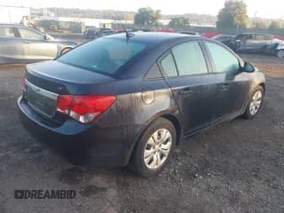 ✅ 2014 Chevrolet Cruze LS • VIN: 1G1PA5SG9E7198443 • Lot: 43258019. Listed on IAAI with 129,257 mi. Free auction sales archive from the USA and detailed vehicle history report at DreamBid. Image 4.