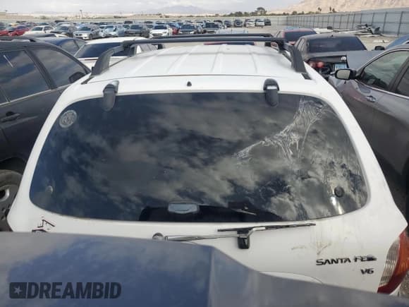 ✅ 2002 Hyundai Santa Fe GLS • VIN: KM8SC73D92U175975 • Лот: 71291915. Опубликован ранее на Copart с пробегом 124 648 миль. Бесплатный доступ к архиву аукционных продаж из США и подробный отчёт об истории автомобиля на DreamBid. Изображение 6.