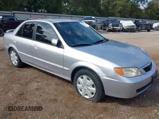 ✅ 2002 Mazda Protege DX • VIN: JM1BJ225421589304 • Lot: 43539423. Wystawiony na IAAI z przebiegiem 176 182 mil. Bezpłatny archiwum sprzedaży aukcyjnych z USA i szczegółowy raport historii pojazdu na DreamBid. Zdjęcie 1.