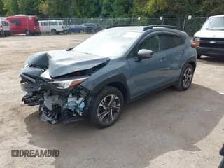 ✅ 2024 Subaru Crosstrek Premium • VIN: JF2GUADC3R8881550 • Lot: 43398265. Listed on IAAI with 5,750 mi. Free auction sales archive from the USA and detailed vehicle history report at DreamBid. Image 2.