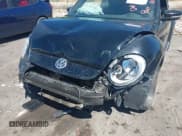 ✅ 2014 Volkswagen Beetle 1.8T • VIN: 3VW517AT6EM821755 • Лот: 42961048. Опубликован ранее на IAAI с пробегом 91 264 миль. Бесплатный доступ к архиву аукционных продаж из США и подробный отчёт об истории автомобиля на DreamBid. Изображение 6.