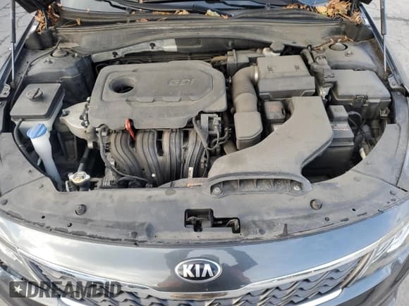 ✅ 2019 Kia Optima S • VIN: 5XXGT4L38KG377387 • Лот: 90328595. Опубликован ранее на Copart с пробегом 92 338 миль. Бесплатный доступ к архиву аукционных продаж из США и подробный отчёт об истории автомобиля на DreamBid. Изображение 11.