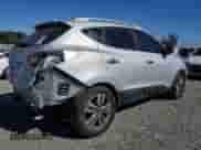 2014 Hyundai Tucson SE z VIN KM8JUCAG7EU843064, wystawiony jako Copart lot #71027575 z przebiegiem 178 099 mil mil oraz Szkoda całkowita • Salvage title. Historia ofert i sprzedaży dostępna na DreamBid. Obrazek 3.