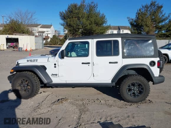 ✅ 2021 Jeep Wrangler Unlimited Sport S • VIN: 1C4HJXDG5MW697149 • Лот: 41642386. Опубликован ранее на IAAI с пробегом 71 253 миль. Бесплатный доступ к архиву аукционных продаж из США и подробный отчёт об истории автомобиля на DreamBid. Изображение 14.