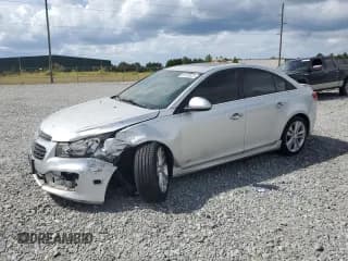✅ 2015 Chevrolet Cruze LTZ • VIN: 1G1PG5SB4F7183935 • Lot: 84209825. Listed on Copart with 132,199 mi. Free auction sales archive from the USA and detailed vehicle history report at DreamBid. Image 1.