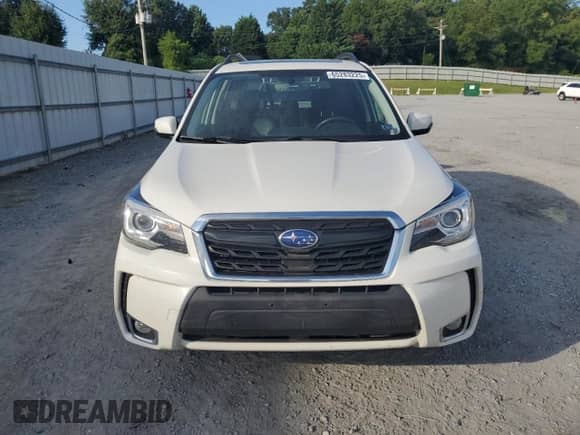 2018 Subaru Forester Touring z VIN JF2SJGWC9JH593863, wystawiony jako Copart lot #65283225 z przebiegiem 50 130 mil mil oraz Szkoda całkowita • Salvage title. Historia ofert i sprzedaży dostępna na DreamBid. Obrazek 5.