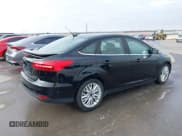 ✅ 2017 Ford Focus Titanium • VIN: 1FADP3J26HL267951 • Lot: 43728220. Listed on IAAI with 84,043 mi. Free auction sales archive from the USA and detailed vehicle history report at DreamBid. Image 4.