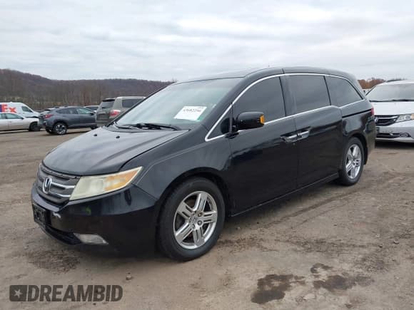 ✅ 2011 Honda Odyssey Touring • VIN: 5FNRL5H90BB014208 • Lot: 43682256. Listed on IAAI with 169,536 mi. Free auction sales archive from the USA and detailed vehicle history report at DreamBid. Image 17.