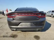 ✅ 2018 Dodge Charger SXT • VIN: 2C3CDXBG4JH281175 • Lot: 90253055. Listed on Copart with 144,521 mi. Free auction sales archive from the USA and detailed vehicle history report at DreamBid. Image 6.