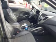 ✅ 2014 Hyundai Veloster • VIN: KMHTC6ADXEU213185 • Lot: 41704012. Wystawiony na IAAI z przebiegiem 144 905 mil. Bezpłatny archiwum sprzedaży aukcyjnych z USA i szczegółowy raport historii pojazdu na DreamBid. Zdjęcie 5.