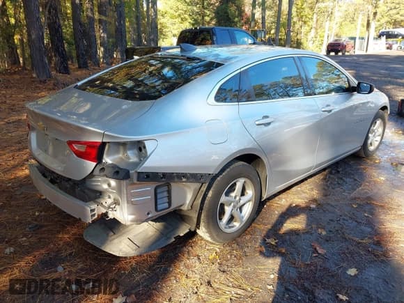 ✅ 2017 Chevrolet Malibu LS • VIN: 1G1ZB5STXHF194883 • Lot: 43582481. Listed on IAAI with 107,181 mi. Free auction sales archive from the USA and detailed vehicle history report at DreamBid. Image 4.