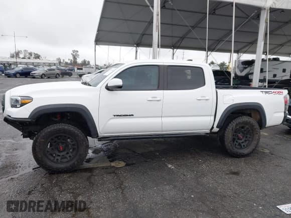 ✅ 2022 Toyota Tacoma SR • VIN: 3TMCZ5AN7NM496008 • Lot: 41559734. Listed on IAAI with 25,726 mi. Free auction sales archive from the USA and detailed vehicle history report at DreamBid. Image 14.