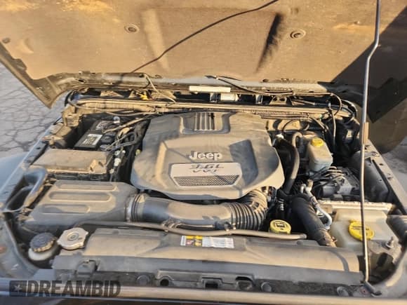 ✅ 2012 Jeep Wrangler Unlimited Rubicon • VIN: 1C4HJWFG7CL242990 • Лот: 92404395. Опубликован ранее на Copart с пробегом 121 247 миль. Бесплатный доступ к архиву аукционных продаж из США и подробный отчёт об истории автомобиля на DreamBid. Изображение 11.