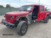 ✅ 2022 Jeep Gladiator Rubicon • VIN: 1C6JJTBG3NL102953 • Lot: 43312000. Listed on IAAI with 57,878 mi. Free auction sales archive from the USA and detailed vehicle history report at DreamBid. Image 2.