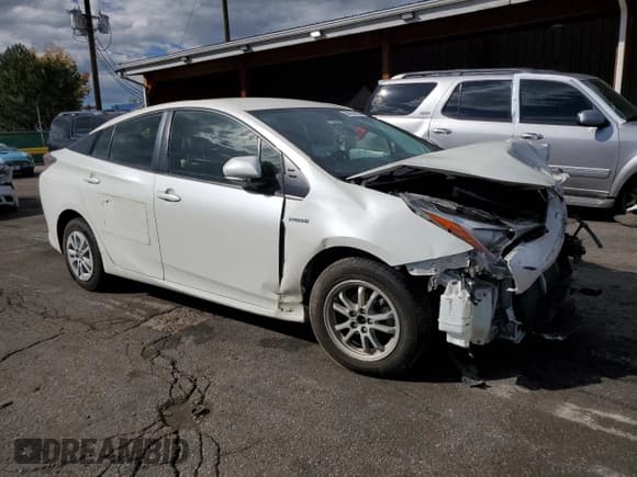 ✅ 2016 Toyota Prius Two • VIN: JTDKBRFU0G3001112 • Lot: 84916145. Listed on Copart with 105,013 mi. Free auction sales archive from the USA and detailed vehicle history report at DreamBid. Image 4.