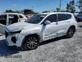 2019 Hyundai Santa Fe SE with VIN 5NMS23AD0KH001903, listed as a Copart auction lot 91165425 with 69,358 mi miles and Salvage title. Bid and sale history available at DreamBid. Image 1.