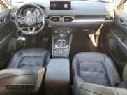 ✅ 2021 Mazda CX-5 Touring • VIN: JM3KFBCM9M0499444 • Lot: 71919565. Wystawiony na Copart z przebiegiem 42 125 mil. Bezpłatny archiwum sprzedaży aukcyjnych z USA i szczegółowy raport historii pojazdu na DreamBid. Zdjęcie 8.