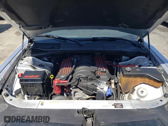 ✅ 2012 Dodge Challenger SRT-8 392 • VIN: 2C3CDYCJ4CH262368 • Lot: 68242864. Wystawiony na Copart z przebiegiem 42 941 mil. Bezpłatny archiwum sprzedaży aukcyjnych z USA i szczegółowy raport historii pojazdu na DreamBid. Zdjęcie 11.