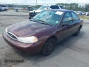 ✅ 2000 Ford Contour SE Fleet • VIN: 1FAFP6633YK127289 • Lot: 43119104. Listed on IAAI with 86,481 mi. Free auction sales archive from the USA and detailed vehicle history report at DreamBid. Image 2.