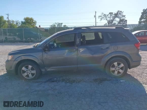 2012 Dodge Journey SXT с VIN 3C4PDCBG5CT395749, выставлен на аукционе IAAI как лот 43411173 с пробегом 172 546 миль миль и . История ставок и продаж доступна на DreamBid. Изображение 14.