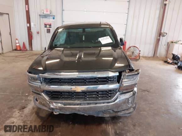 2018 Chevrolet Silverado 1500 LT z VIN 3GCUKREC0JG519095, wystawiony jako IAAI lot #43271594 z przebiegiem 108 548 mil mil oraz . Historia ofert i sprzedaży dostępna na DreamBid. Obrazek 12.