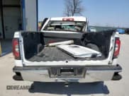 ✅ 2018 GMC Sierra 1500 SLT • VIN: 3GTU2NEC7JG313412 • Лот: 49053805. Опубликован ранее на Copart с пробегом 148 302 миль. Бесплатный доступ к архиву аукционных продаж из США и подробный отчёт об истории автомобиля на DreamBid. Изображение 6.