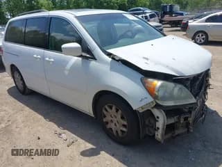 ✅ 2009 Honda Odyssey Touring • VIN: 5FNRL38829B014152 • Lot: 42160341. Listed on IAAI with 206,532 mi. Free auction sales archive from the USA and detailed vehicle history report at DreamBid. Image 1.
