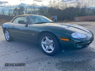 ✅ 1997 Jaguar XK • VIN: SAJGX2748VC006585 • Lot: 95865615. Listed on Copart with 83,518 mi. Free auction sales archive from the USA and detailed vehicle history report at DreamBid. Image 1.