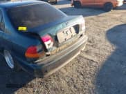 ✅ 1997 Honda Civic LX • VIN: 2HGEJ6675VH586130 • Lot: 43456235. Listed on IAAI with 229,100 mi. Free auction sales archive from the USA and detailed vehicle history report at DreamBid. Image 6.