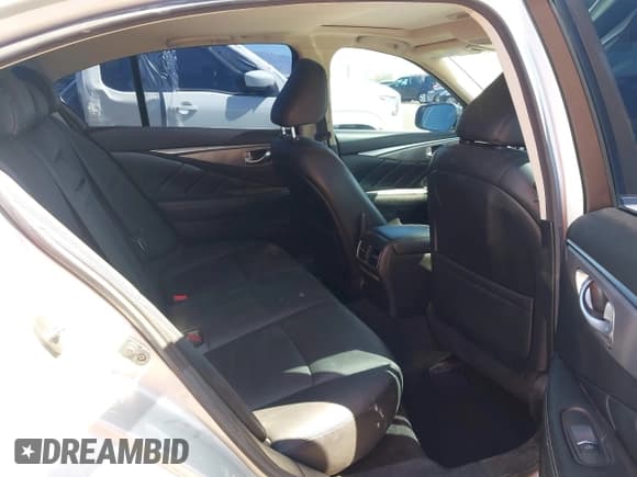 ✅ 2016 Infiniti Q50 Premium • VIN: JN1CV7AP6GM200647 • Lot: 42111328. Listed on IAAI with 97,521 mi. Free auction sales archive from the USA and detailed vehicle history report at DreamBid. Image 8.