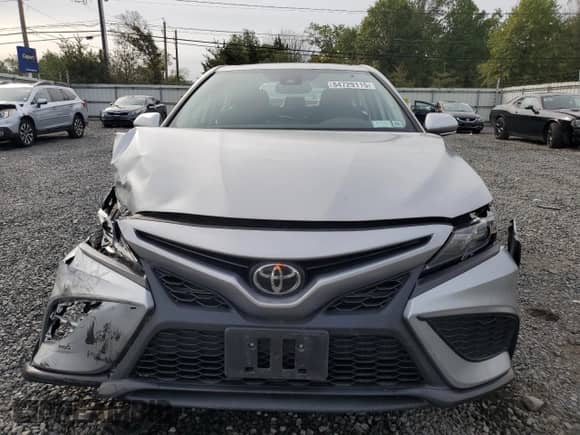 2022 Toyota Camry SE с VIN 4T1T11BK6NU060794, выставлен на аукционе Copart как лот 84729115 с пробегом 39 327 миль миль и Списание • Salvage title. История ставок и продаж доступна на DreamBid. Изображение 5.
