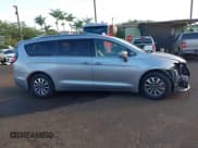 ✅ 2021 Chrysler Pacifica Hybrid Touring L • VIN: 2C4RC1L7XMR581385 • Lot: 43566058. Listed on IAAI with 6,979 mi. Free auction sales archive from the USA and detailed vehicle history report at DreamBid. Image 14.