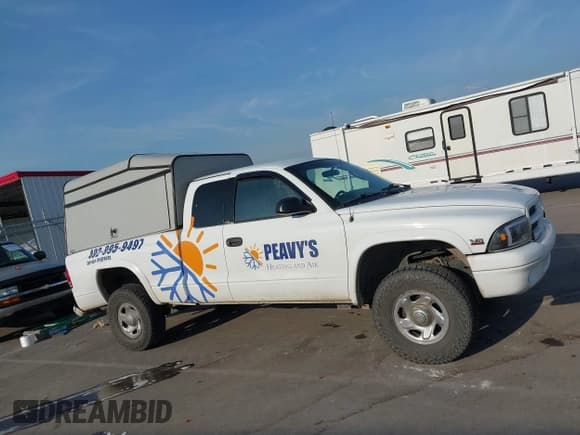 ✅ 2000 Dodge Dakota Sport • VIN: 1B7GG22N3YS765590 • Лот: 43192807. Опубликован ранее на IAAI с пробегом 113 245 миль. Бесплатный доступ к архиву аукционных продаж из США и подробный отчёт об истории автомобиля на DreamBid. Изображение 13.