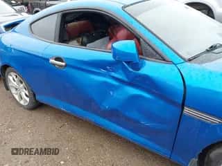 2008 Hyundai Tiburon GT z VIN KMHHN66FX8U282926, wystawiony jako IAAI lot #41959023 z przebiegiem 119 414 mil mil oraz . Historia ofert i sprzedaży dostępna na DreamBid. Obrazek 6.