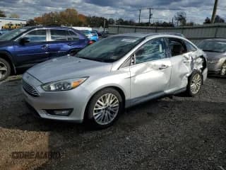 ✅ 2015 Ford Focus Titanium • VIN: 1FADP3J20FL304117 • Лот: 90983835. Опубликован ранее на Copart с пробегом 110 223 миль. Бесплатный доступ к архиву аукционных продаж из США и подробный отчёт об истории автомобиля на DreamBid. Изображение 1.