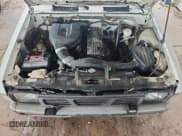 ✅ 1993 Nissan Frontier • VIN: 1N6SD11SXPC313758 • Лот: 69473175. Опубликован ранее на Copart с пробегом 231 377 миль. Бесплатный доступ к архиву аукционных продаж из США и подробный отчёт об истории автомобиля на DreamBid. Изображение 11.