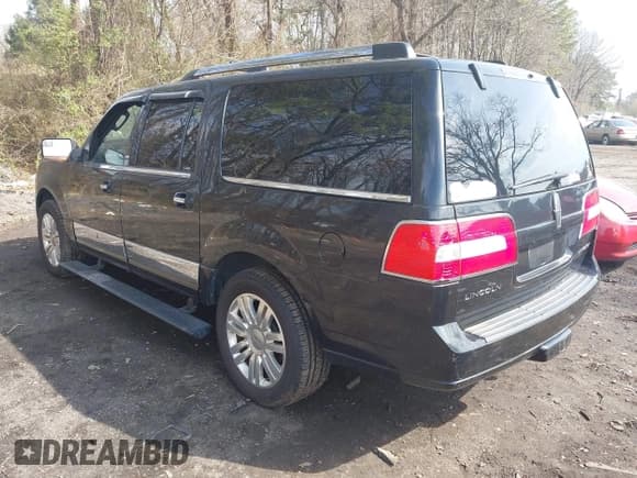 ✅ 2014 Lincoln Navigator • VIN: 5LMJJ3J56EEL04885 • Lot: 42051762. Listed on IAAI with 162,851 mi. Free auction sales archive from the USA and detailed vehicle history report at DreamBid. Image 3.