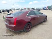 ✅ 2014 Cadillac ATS Performance RWD • VIN: 1G6AC5SXXE0185431 • Lot: 42785002. Listed on IAAI with 138,543 mi. Free auction sales archive from the USA and detailed vehicle history report at DreamBid. Image 4.