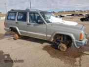 ✅ 2001 Jeep Cherokee Sport • VIN: 1J4FF48S21L574678 • Lot: 95910125. Listed on Copart with Not provided. Free auction sales archive from the USA and detailed vehicle history report at DreamBid. Image 4.